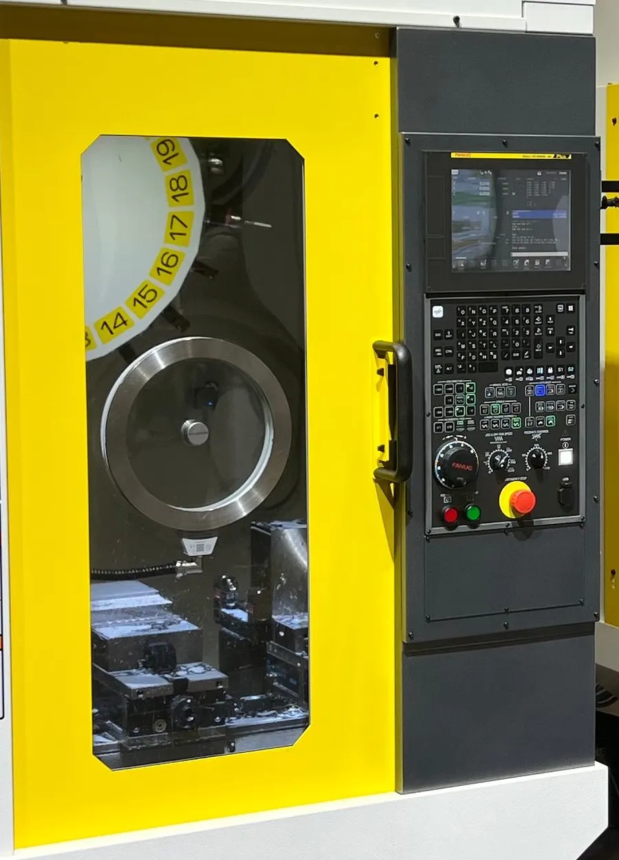 FANUC ROBODRILL door at a trade show with a Rotoclear S3 spinning window mounted on the door window